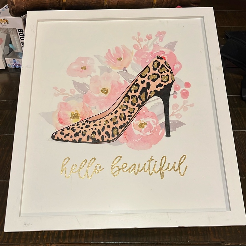 This is a wood framed media. This is part of the Blush Rush Collection. Elegant.